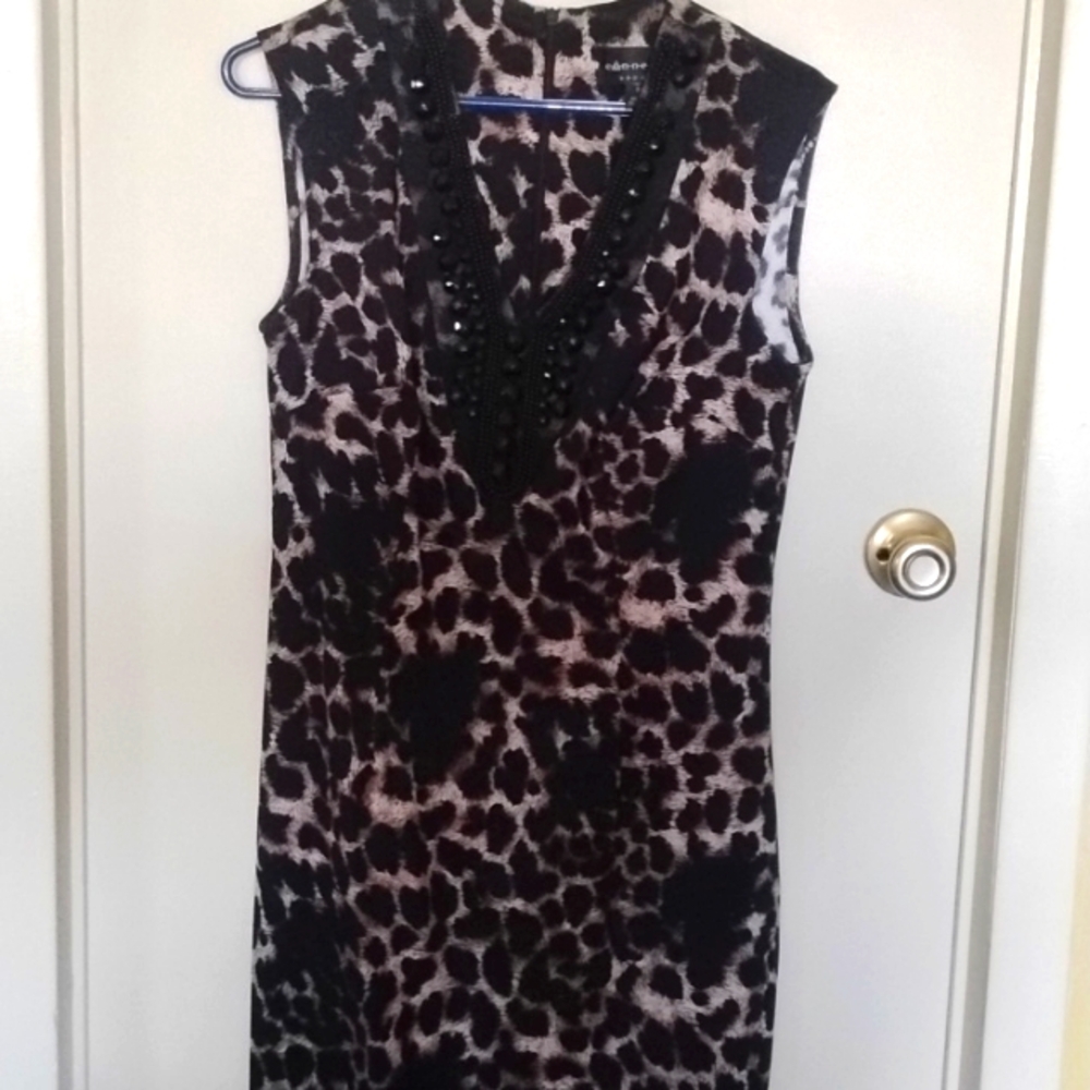 Animal print dress with sequined v neckline